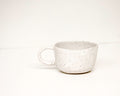 a cup ~ speckled white